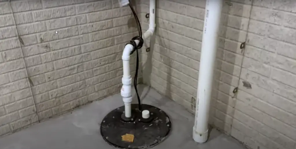 Typical sump pump installation. How much does it cost to install a sump pump like this? That depend up[on where you live.